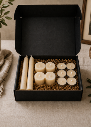 LOONMOON Core Beeswax Candle Box with 2 taper candles, 4 votives, and 6 tealights in a black gift box on a warm Canadian homestead table