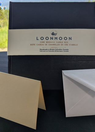 LOONMOON Core Beeswax Candle Box with minimalist black gift box, belly band, blank greeting card, and envelope.