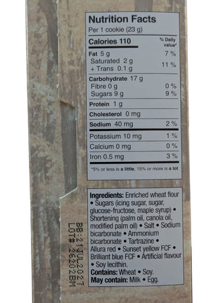 English Nutrition Facts and ingredients panel for the Canadian maple cream cookies, showing nutrition information per 23 g cookie and maple syrup among the ingredients. The cookies contain wheat and soy and may contain milk and egg, providing shoppers with detailed ingredient and allergen information before purchase.
