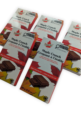 Five Canadian Maple Crunch milk chocolate bars made with pure Canadian maple syrup arranged in an angled display. Product of Canada maple chocolate gift.  Displaying multiple bars together highlights this authentic Canadian maple chocolate collection, making it ideal for sharing, gifting, or stocking your pantry.