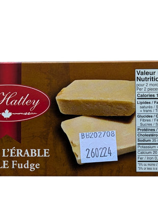 Package panel for Canadian maple fudge showing the bilingual Nutrition Facts and an image of the fudge pieces inside. A serving of two pieces (40 g) contains 150 calories and 30 g of sugars, providing nutritional information for this 60 g Canadian maple confection.