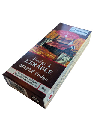 Angled view of a 60 g Canadian maple fudge box showing the front, side and depth of the package against a white background. Made with pure maple syrup, this Canadian-made cream and butter fudge is packaged as a compact maple confection for gifting or enjoying as a sweet treat.