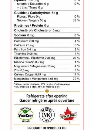 Nutrition Facts panel for pure Canadian maple syrup showing calories, carbohydrates, naturally occurring minerals, refrigeration instructions, and vegan and kosher certifications.  Product information for authentic Canadian maple syrup produced in Canada with detailed nutritional values and storage guidance.