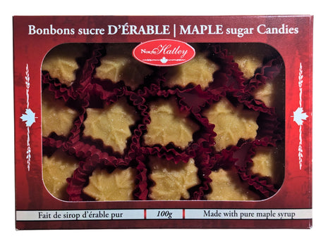 Front view of a 100 g box of Canadian maple sugar candies, with maple-leaf-shaped candies visible through the package window. Made in Canada with pure maple syrup, these traditional maple candies showcase the flavour of Canadian maple.