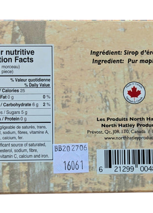 Back of the Canadian maple sugar candy package showing the bilingual Nutrition Facts, pure maple syrup ingredient statement, Canadian origin information and barcode. Each maple-leaf candy is approximately 7 g and is made from pure maple syrup.