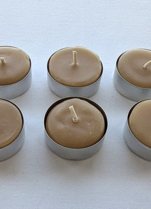 Six natural beeswax tealight candles arranged in two neat rows on a clean white background, showing their warm golden colour, cotton wicks, and individual metal cups.  These tealights are part of the LOONMOON Core Beeswax Candle Gift Box and provide a simple, ready-to-use candlelight option for gifting or everyday use.