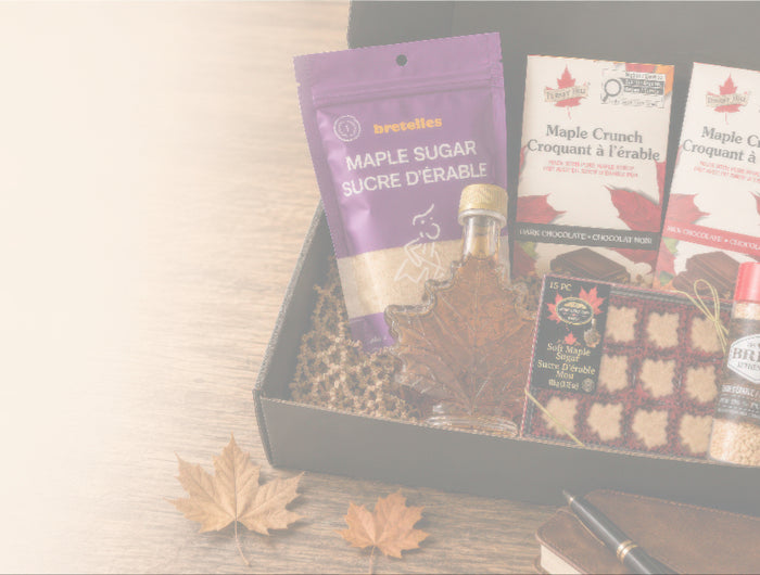 Translucent image of Canadian Father’s Day maple gift box with maple syrup, maple sugar, maple Belgian chocolates, and soft maple candies packed in British Columbia.
