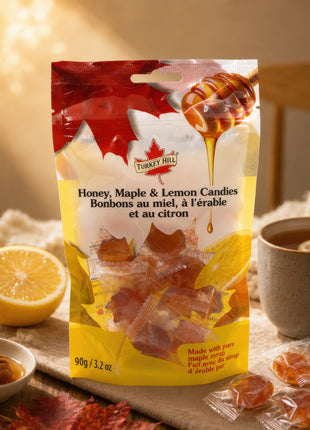 Honey, maple and lemon candies made with pure maple syrup, shown with fresh lemon and honey in a warm rustic setting
