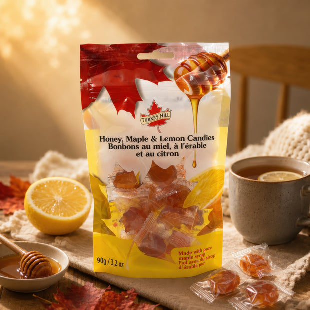 Honey, maple and lemon candies made with pure maple syrup, shown with fresh lemon and honey in a warm rustic setting