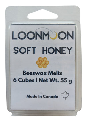 LOONMOON Soft Honey beeswax melts shown in a clear clamshell package on a clean white background.  The label clearly identifies the soft honey scent, six cubes, and 55 g net weight, making this a strong product-focused image for the single scent page.