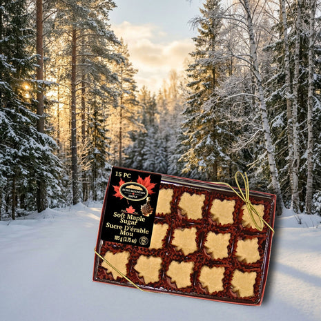 Soft maple sugar candies in a gift box set against a snowy Canadian forest with warm, golden sunlight, evoking a cozy winter scene, showcasing authentic Canadian maple treats